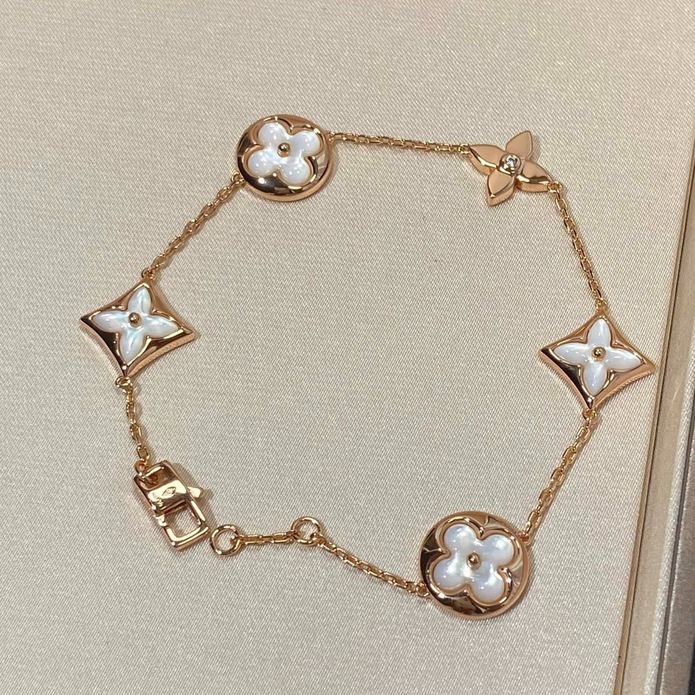 [Glow Muse]STAR AND SUN 5 MOTIF MOP PINK GOLD BRACELET