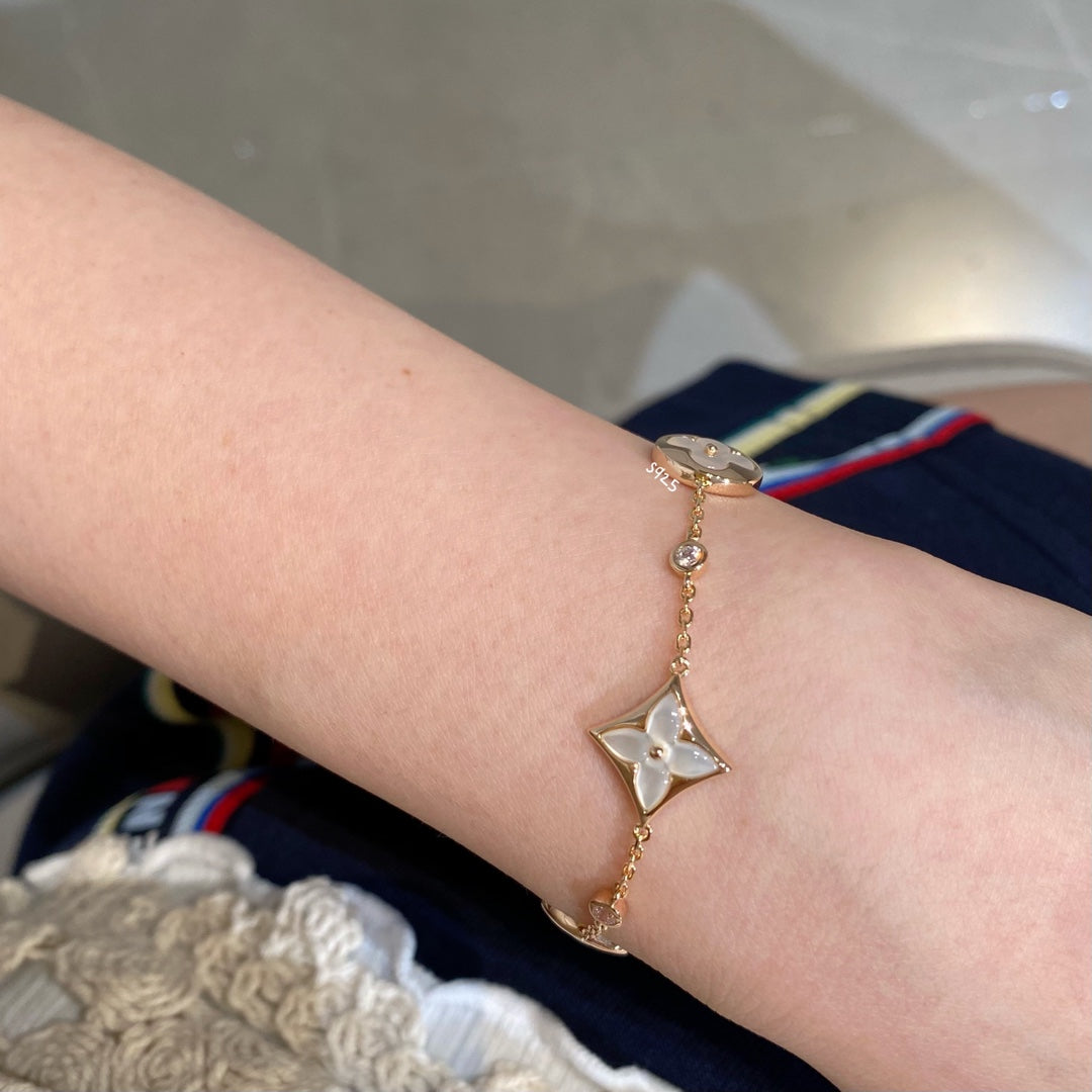 [Glow Muse]STAR AND SUN 4 MOTIF WHITE MOP PINK GOLD BRACELET